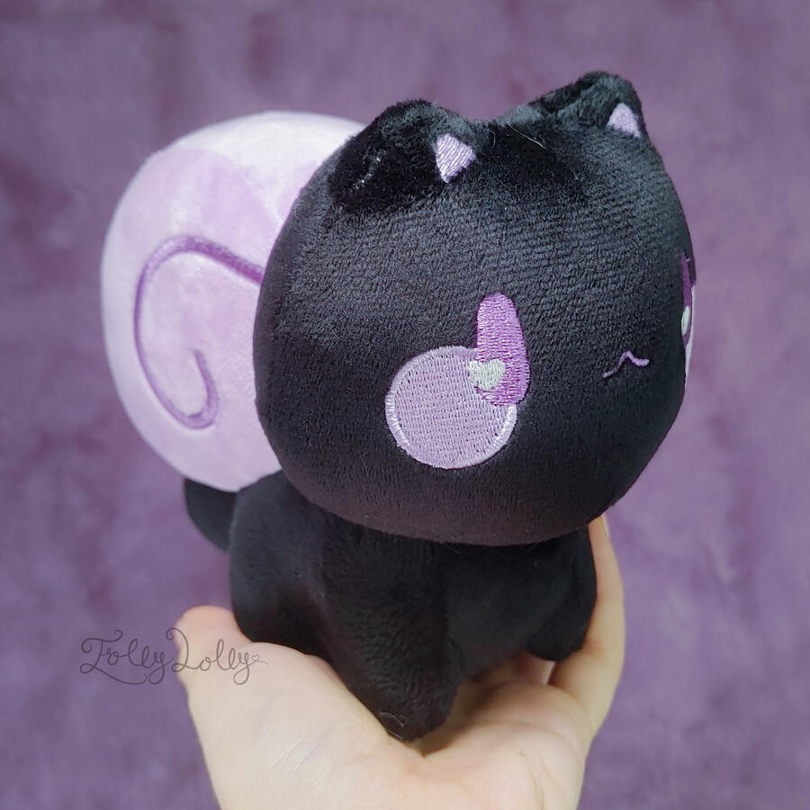 Unlucky snitten A black snail-cat plush with a purple shell