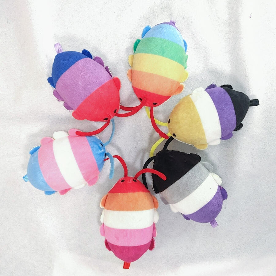 Pridesopods A circle of pride flag-themed isopod plushies