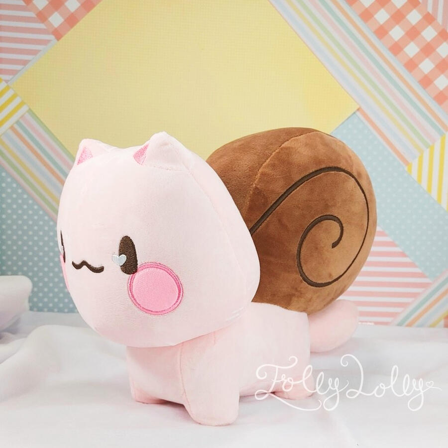 Snat A pink snail-cat plush with a brown shell