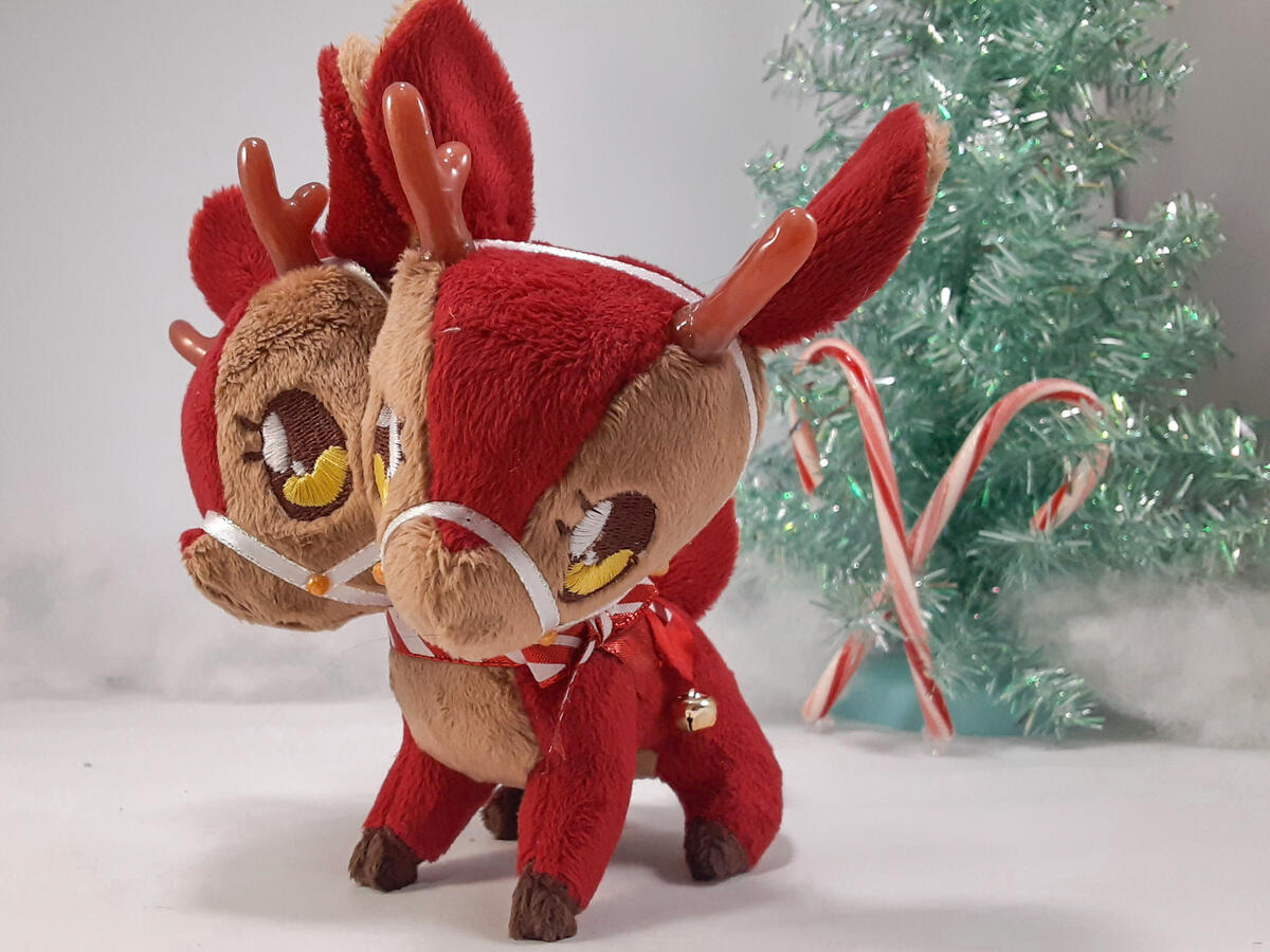 Christmas Doppel Reindeer (2022) A red and brown two-headed reindeer