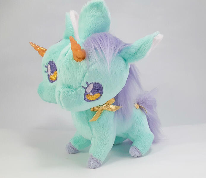 Mint Doppel Unicorn A mint green two-headed unicorn plush with gold and lavender accents