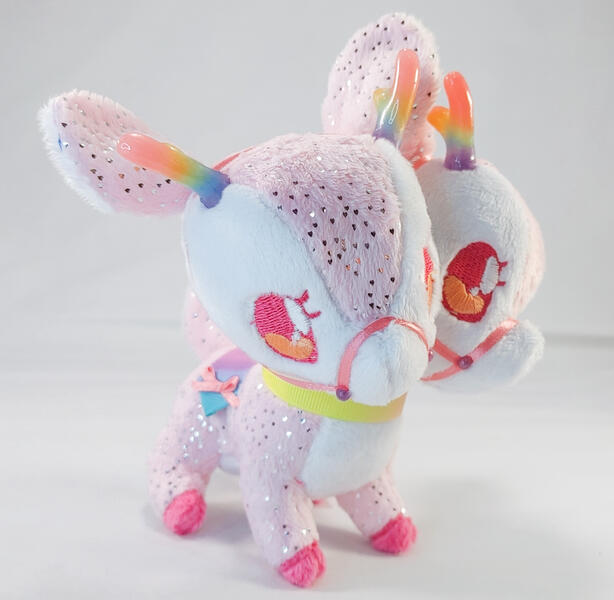 Pastel Rainbow Doppel Reindeer A sparkly pink and white two-headed deer plush with a rainbow harness and horns